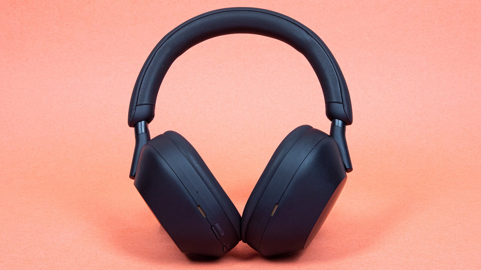 headphones against orange background